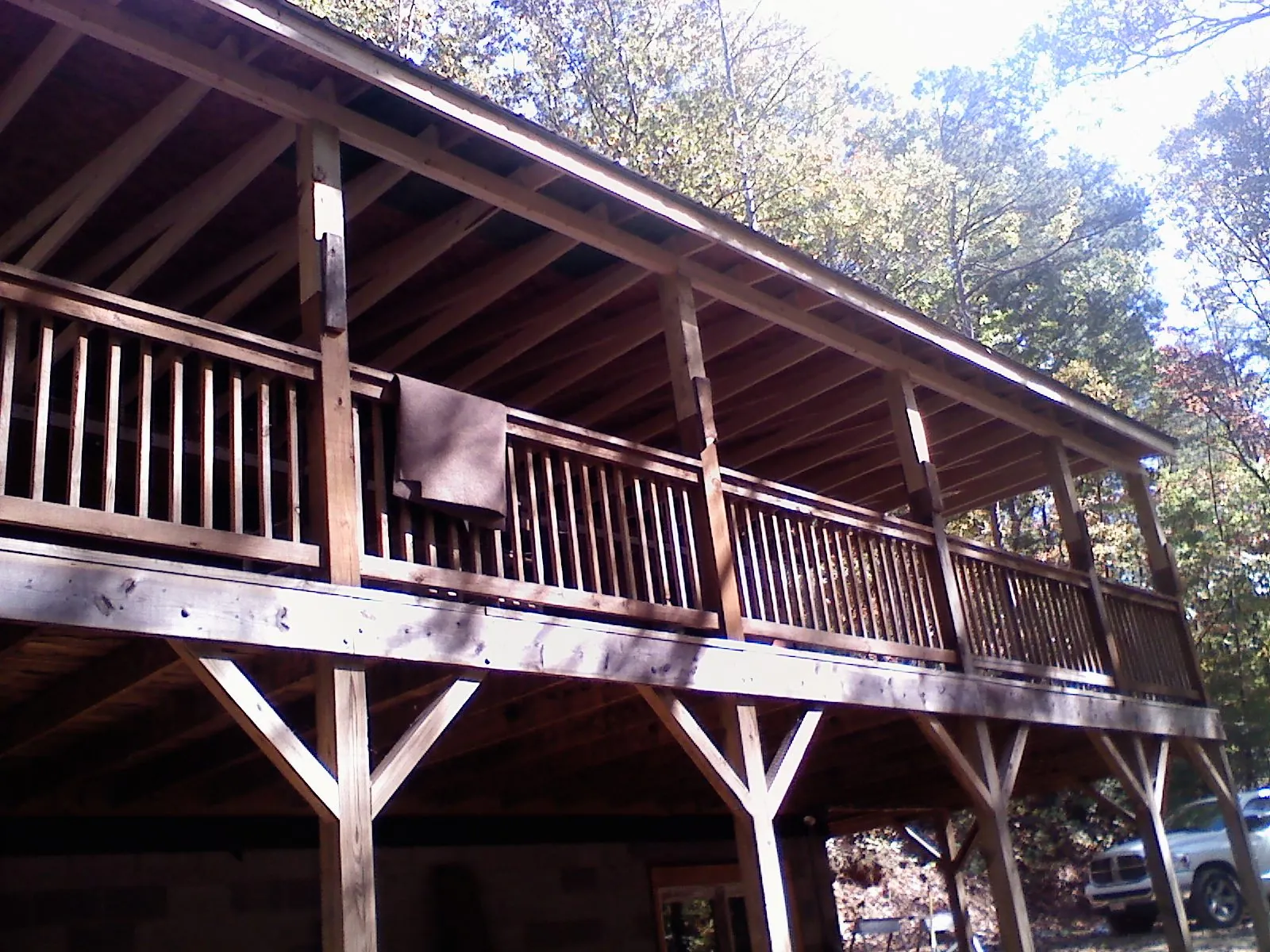 Timber framing under a new elevated porch and deck — Roof Leak Repair in Bridge City by Roofing Brothers